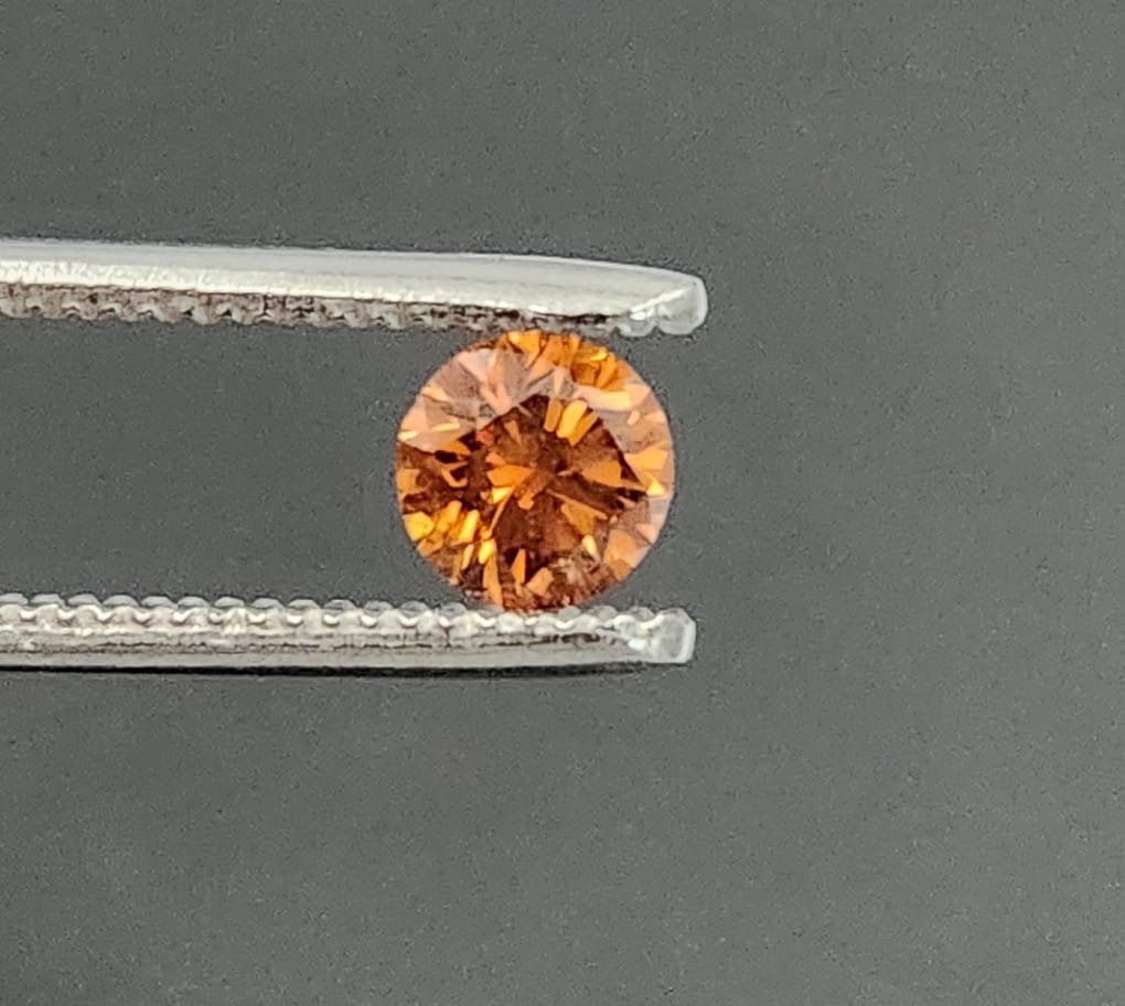 0.69 carat Fancy Deep Yellowish Orange