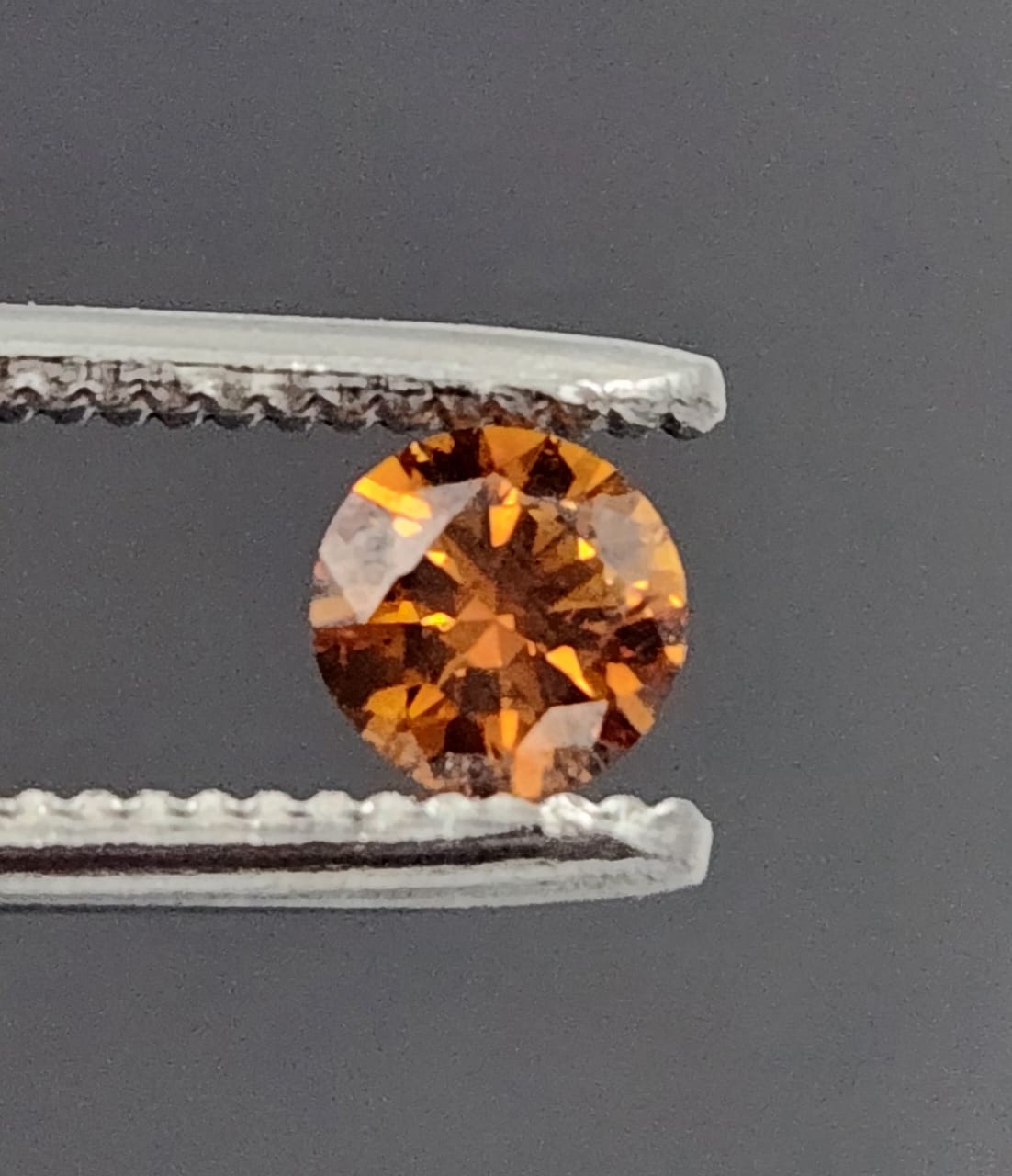 0.64 carat Fancy deep yellowish orange