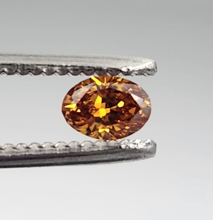 0.453 carat Vivid fancy brownish orange