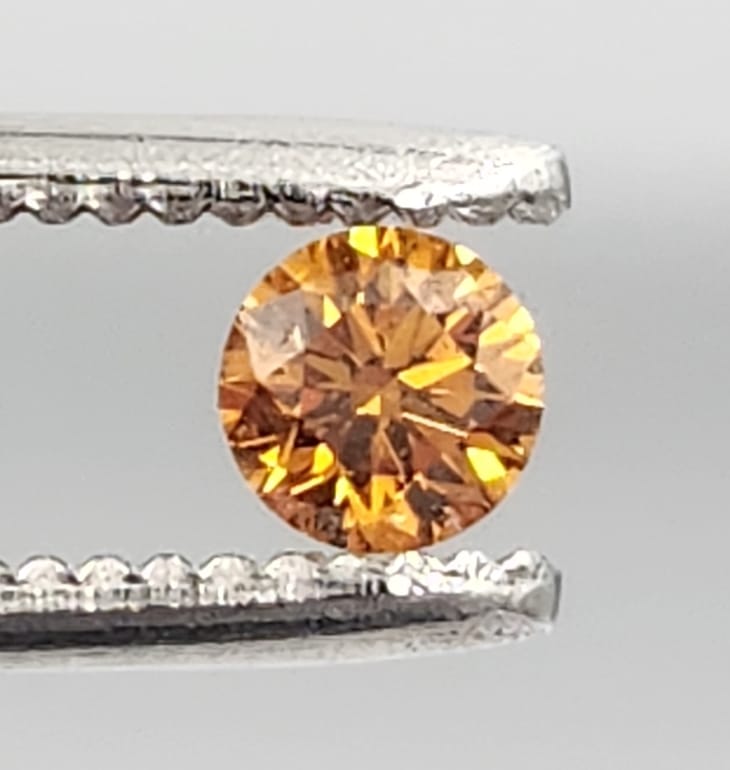 0.382 carat Vivid fancy brownish Orange