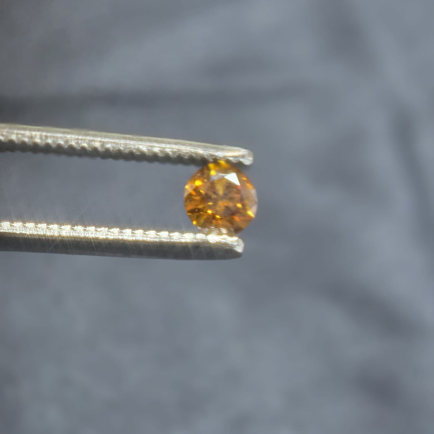 0.55 carat Fancy dark yellow brown