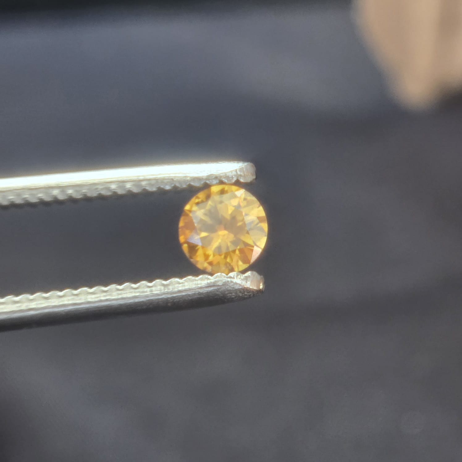 0.40 carat Vivid fancy brown yellow