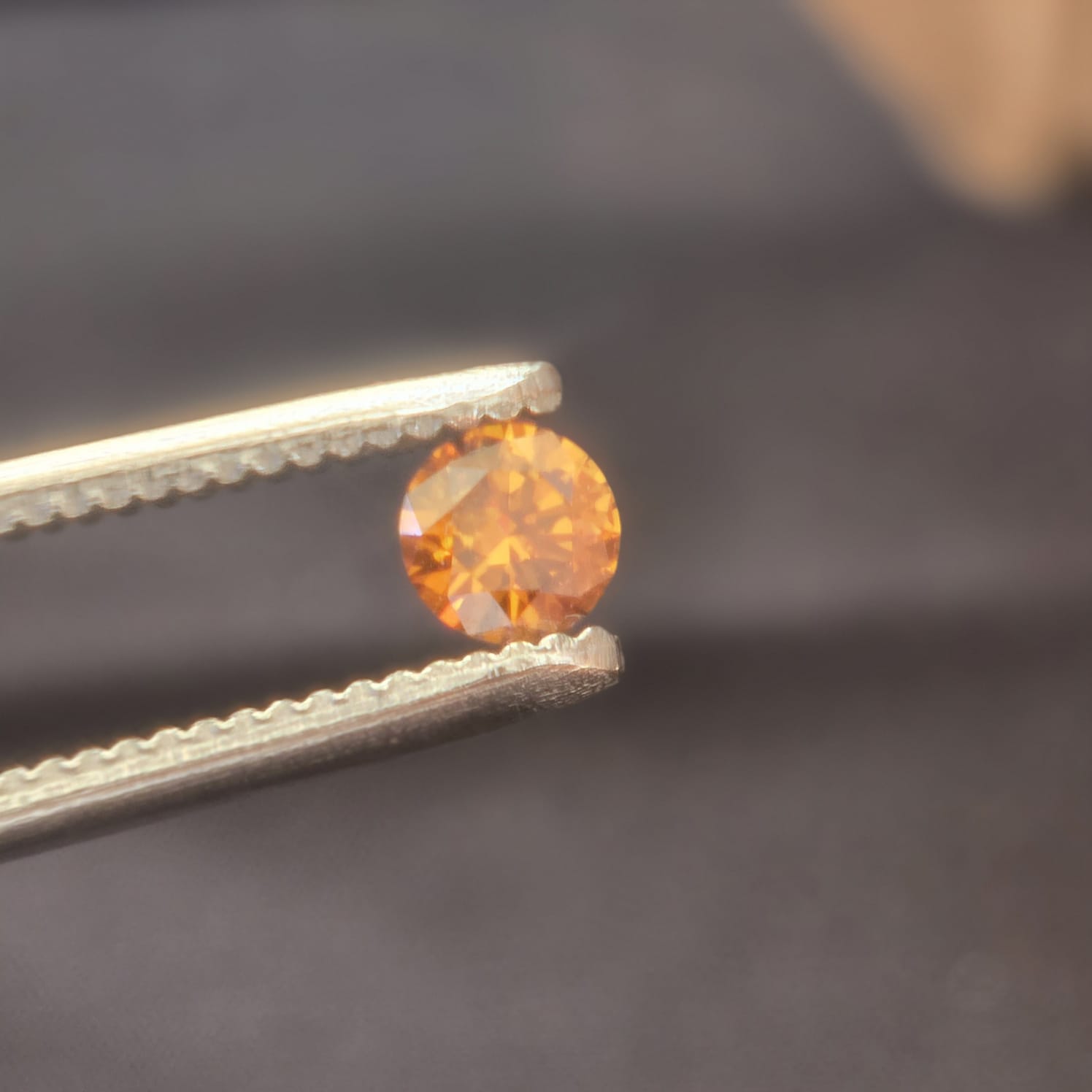 0.37 carat Vivid fancy brown orange