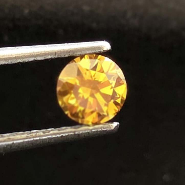 0.47 carat fancy dark brownish yellow