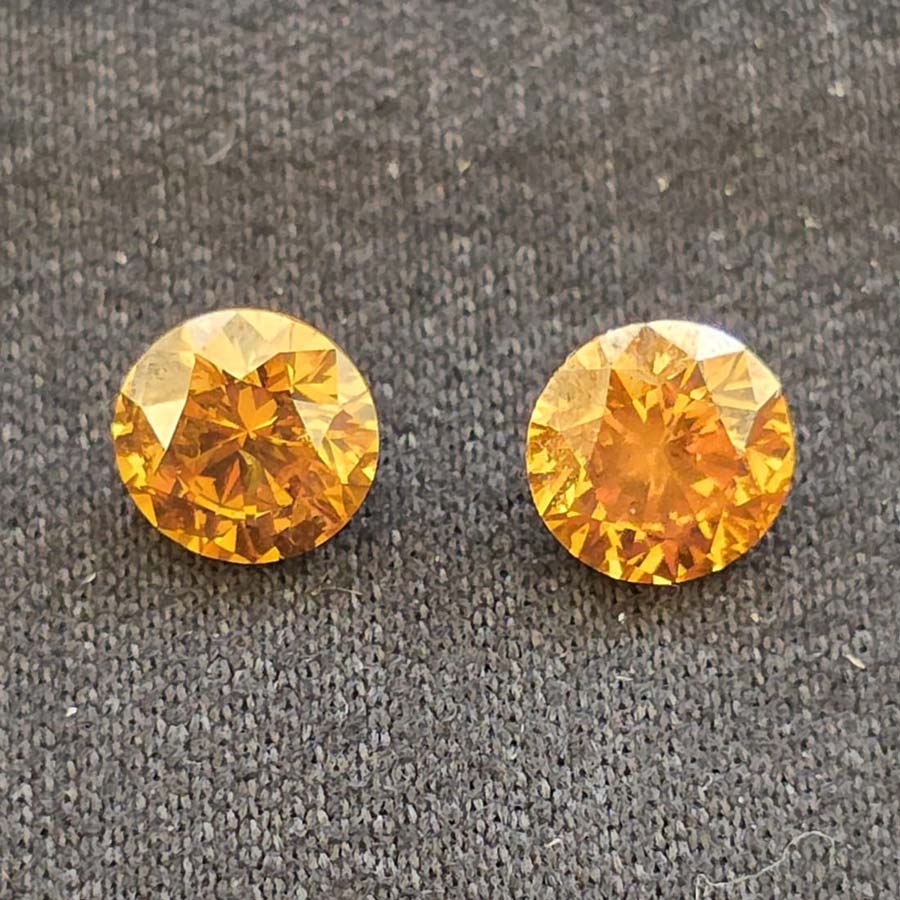 0.54 + 0.53 carat marching pair vivid fancy brown orange
