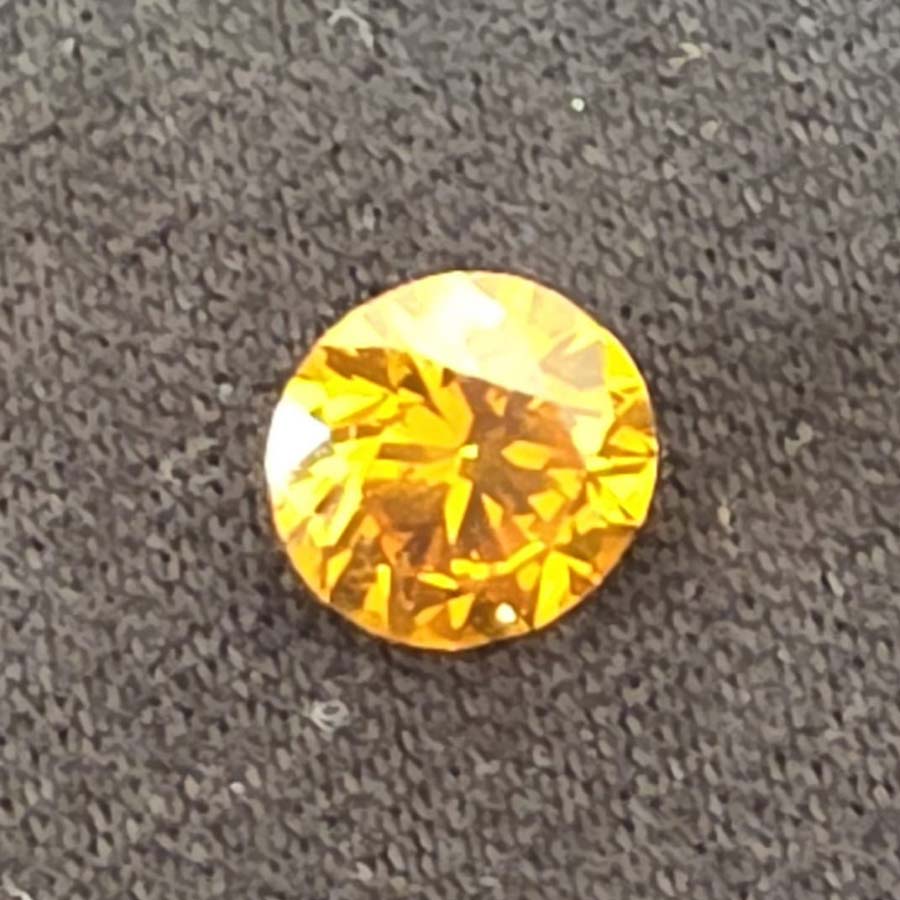 0.54 carat vivid fancy brownish yellow