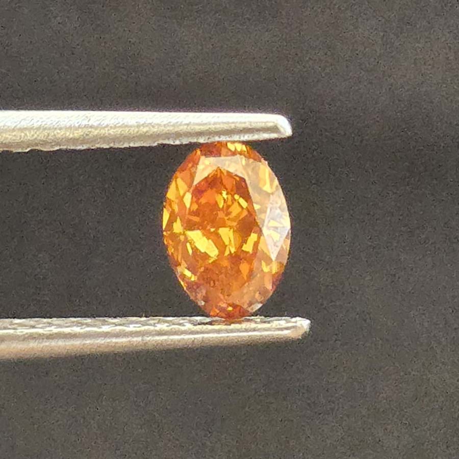 0.62 carat Fancy vivid brown orange Si2