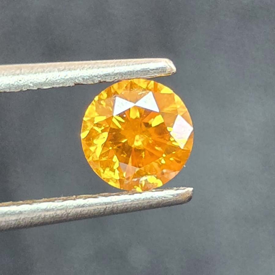 0.62 carat fancy dark yellow orange