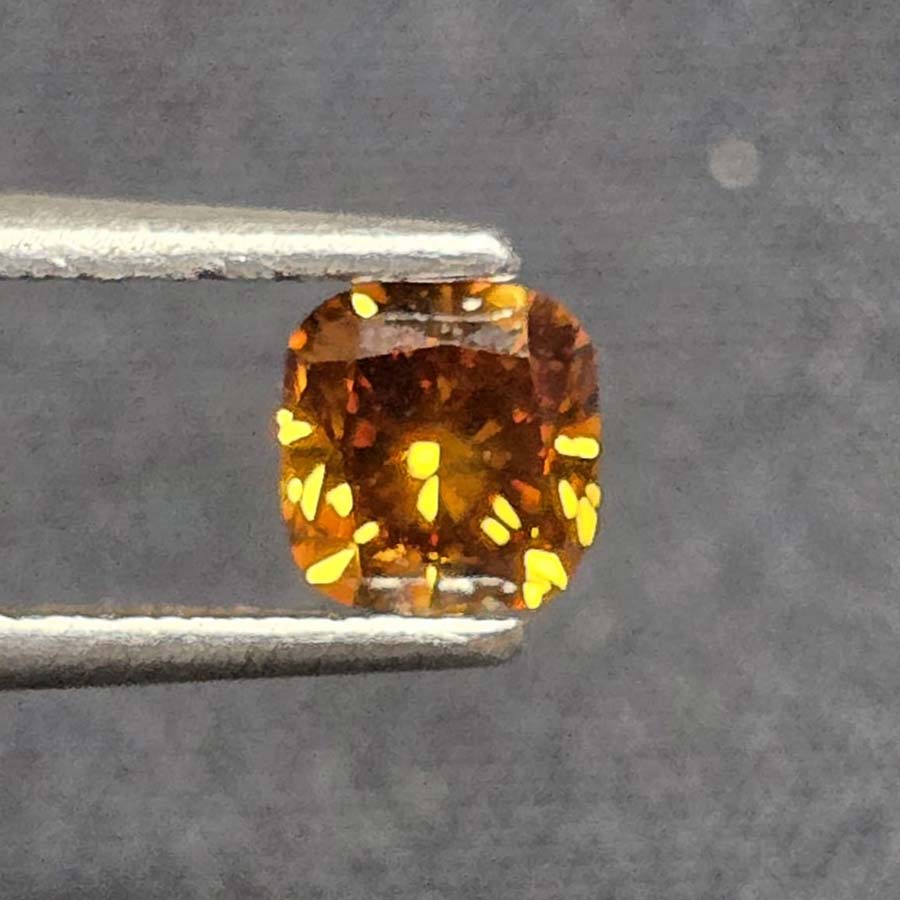 0.71 carat square radiant vivid fancy brownish orange