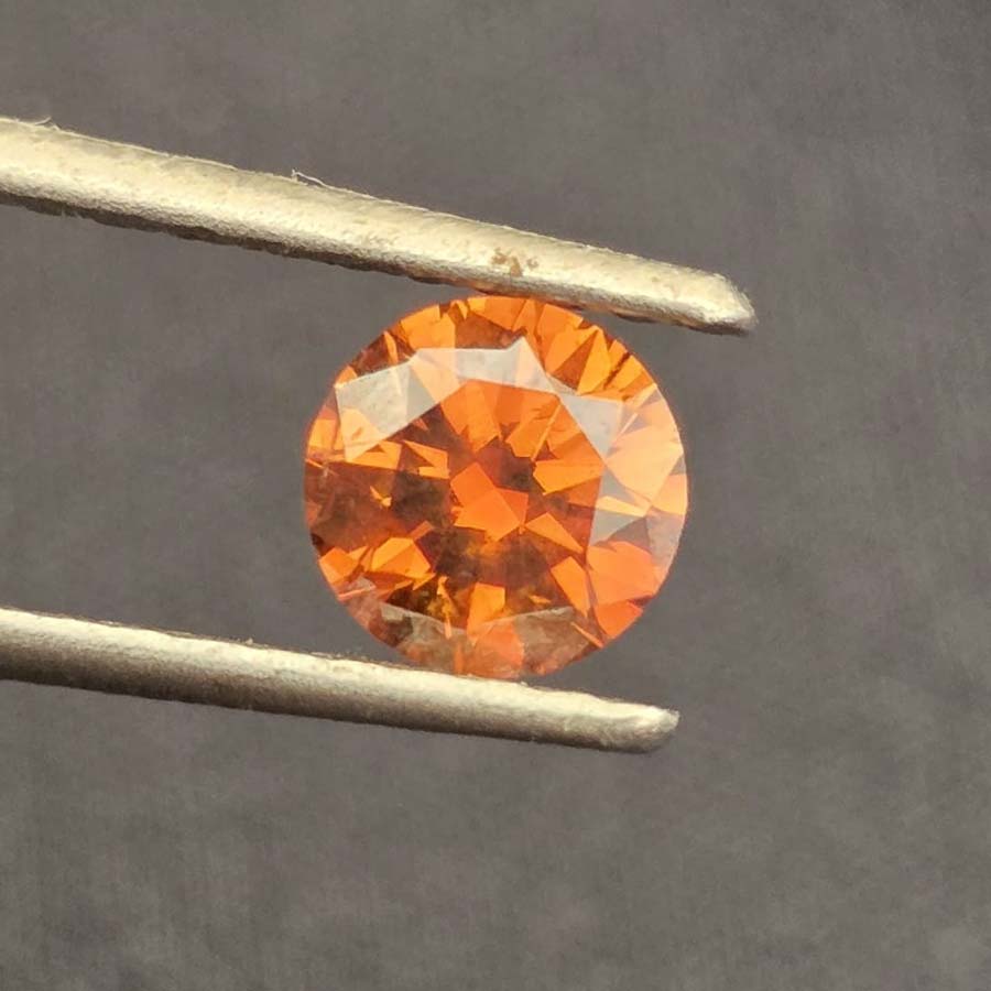 0.71 carat fancy dark brownish orange