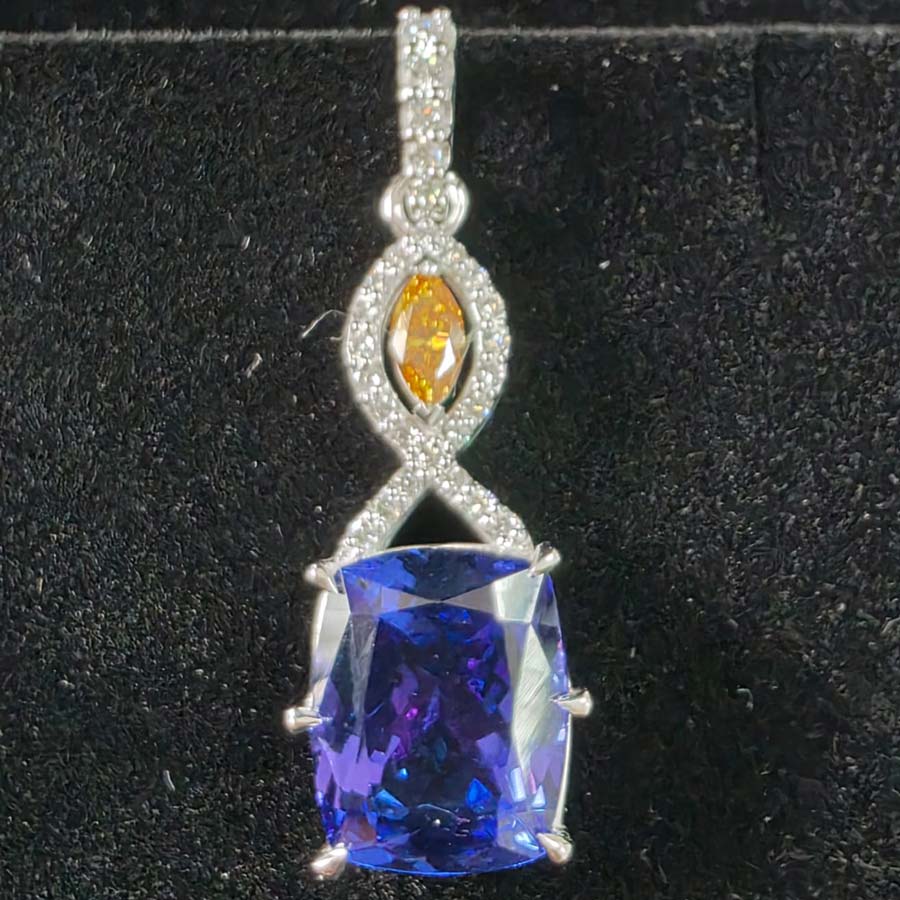 Tanzanite 8.08ct, natural fancy Yellow orange marquise, 14ct whitegold, natural white diamonds